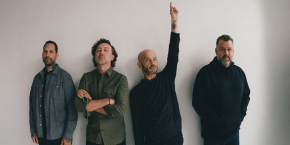 Die vier Bandmitglieder von Rise Against